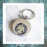 assieraden-rvs-sleutelhanger-engeltje-met-as