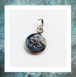 assieraden-assieraad-met-as-asjuweeltje-assieraad-ashanger-circel-rvs