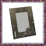 Tinnen fotolijst bewerkt met natuurmotief