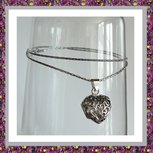 assieraden,assieraad,asketting,medaillon,asjuweel,zilver,asverwerking,rouwsieraden,uitvaartwinkel