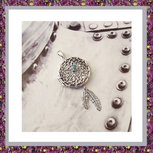 assieraden,assieraad,asketting,medaillon,asjuweel,zilver,asverwerking,rouwsieraden,uitvaartwinkel