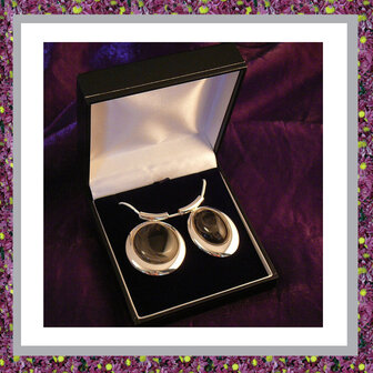assieraden-haar-hanger-haarlok-in-sieraden-juwelen-juweeltje-gedenksieraden-haarlokhanger-zilver-rond