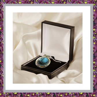 assieraden-haar-hanger-haarlok-in-sieraden-juwelen-juweeltje-gedenksieraden-haarlokhanger-rvs-rond