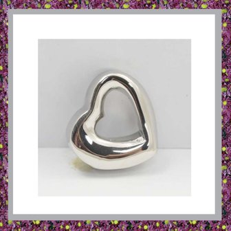 assieraden,assieraad ketting,ashanger,gedenksieraden,asjuweel,gedenksieraad,asverwerking in sieraad,rouwsieraden,uitvaartwinkel